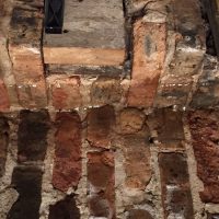 leaking brick wall